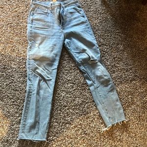 Madewell perfect vintage jean light blue wash hole in left leg near thigh